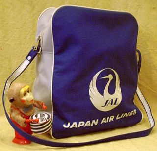 JAL Tasche mit KOMATSU Werbung als Beuteltasche bzw. Handtasche für den Herrn